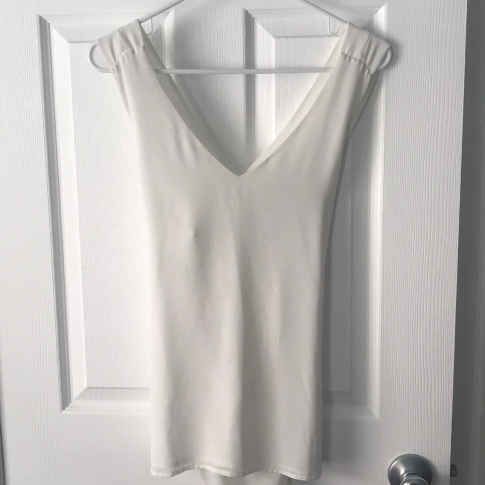 White tank top with cross-back detail